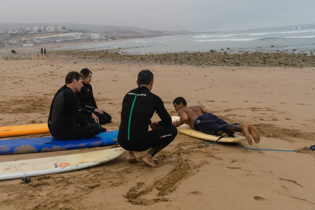 Group learning to surf at Villa Mandala