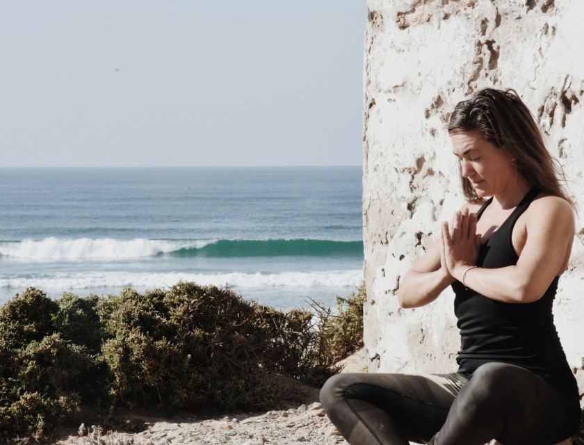 Yoga pose overlooking the ocean
