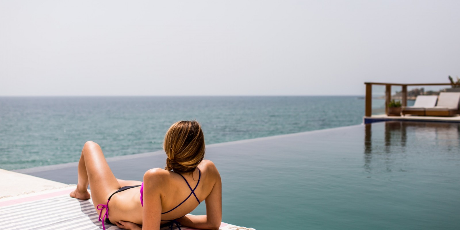 Pool side view in Amouage